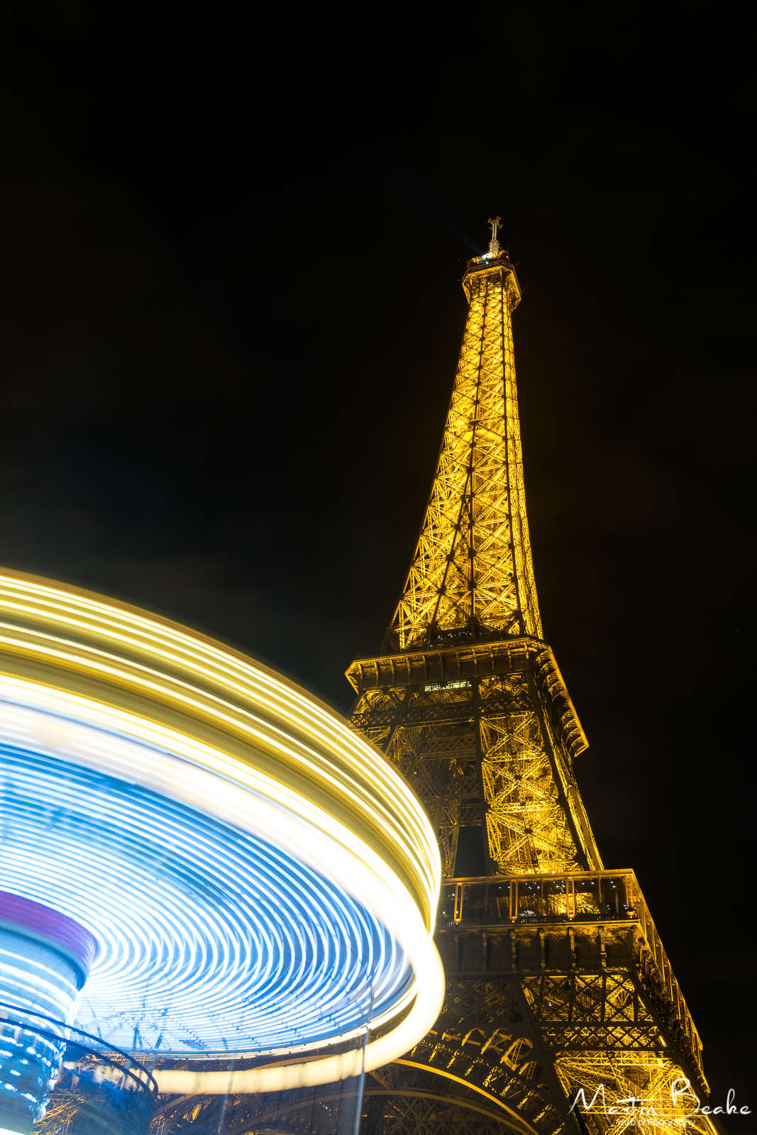 Eiffel Tower and Carousel at Night