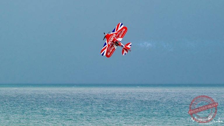 Rich Goodwin Pitts Special Against a Stormy Sky