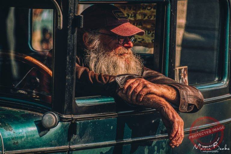 Gentleman Sitting in Model T Ford
